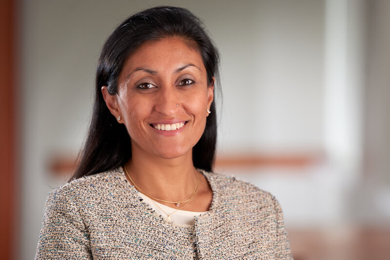 A professional headshot of Neha Pagidipati